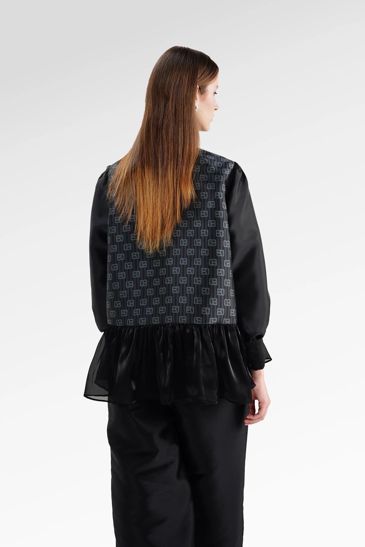The Monogram Peplum Shirt - Black
